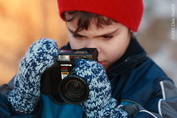 A Young Photographer Concentrating